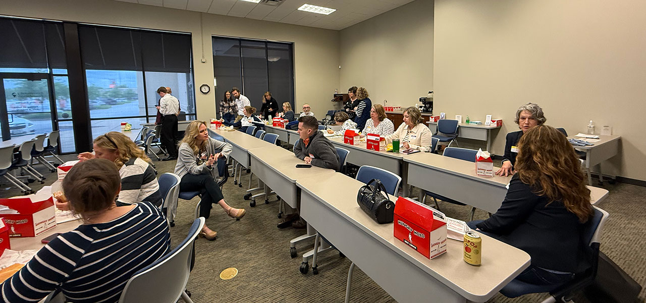 photo of networking at monthly meeting